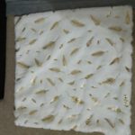 coussin plume dorée